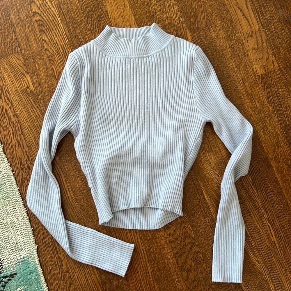 Mock neck light blue sweater with cute back
